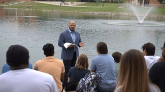 Dr. Trent Rogers teaching a Bible class outside