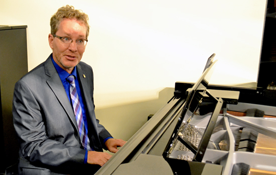 Dr. John Mortensen was honored with a reception for his work as a Steinway artist