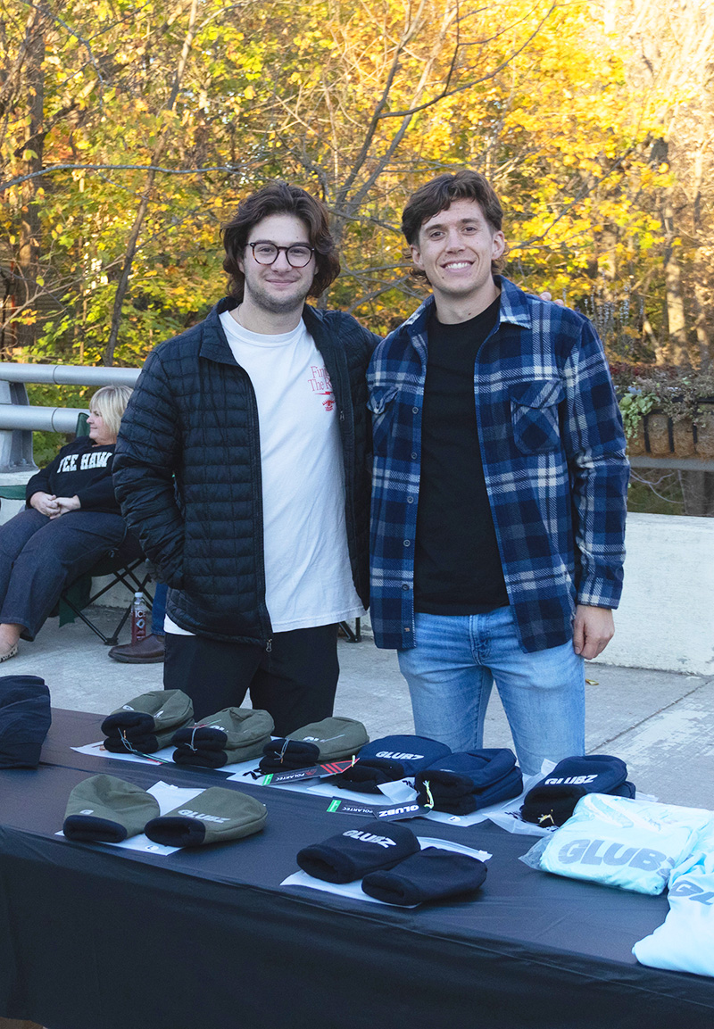 Aaron Perry and Cooper Peterson, students at Cedarville University, market the products made by their companies at a Sidewalk Saturday event.