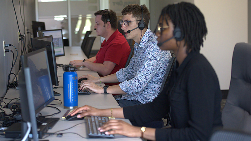 Cedarville students working in the pharmacy call center 858