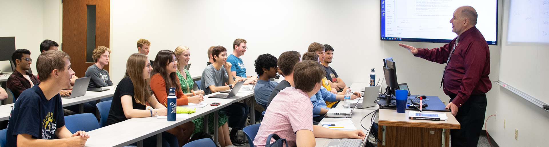 Dr. Gallagher teaching a Cyber Operations Class 1920