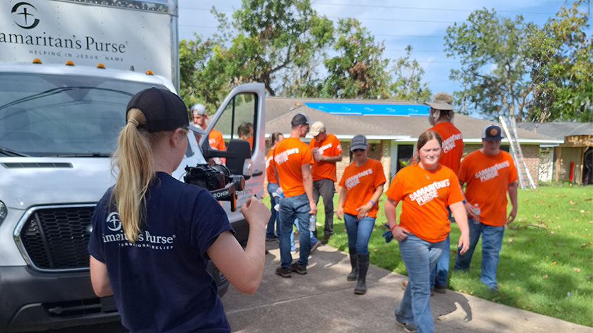 Elizabeth Kollmar filming disaster relief team in Texas 858