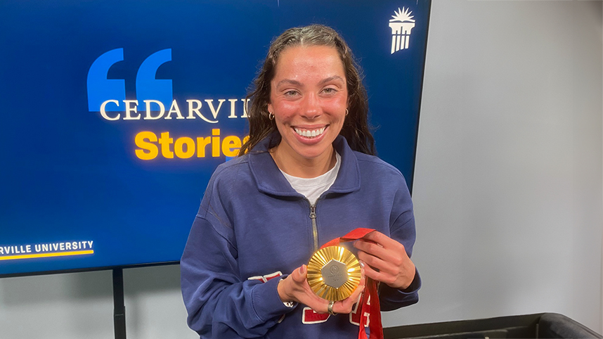 Grace Norman with her 2024 Gold Medal during the recording of the Cedarville Stories podcast.