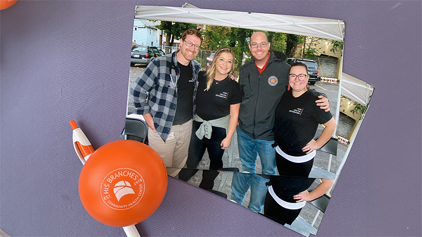 Promotional photo of the executive team at His Branches, a clinic in Rochester, New York led by Cedarville graduates Brad and Melissa VanHeukelum