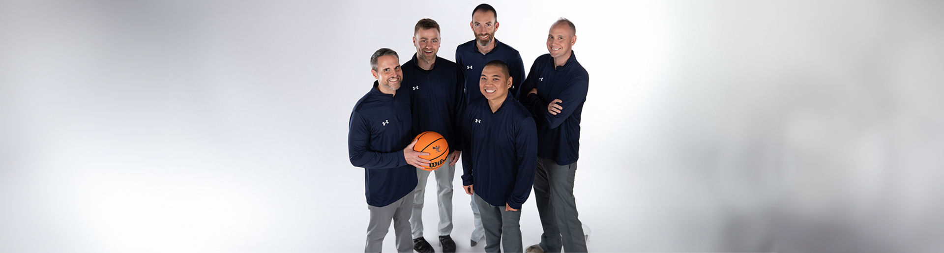 Rob Jones and the CU mens basketball coaches 1920