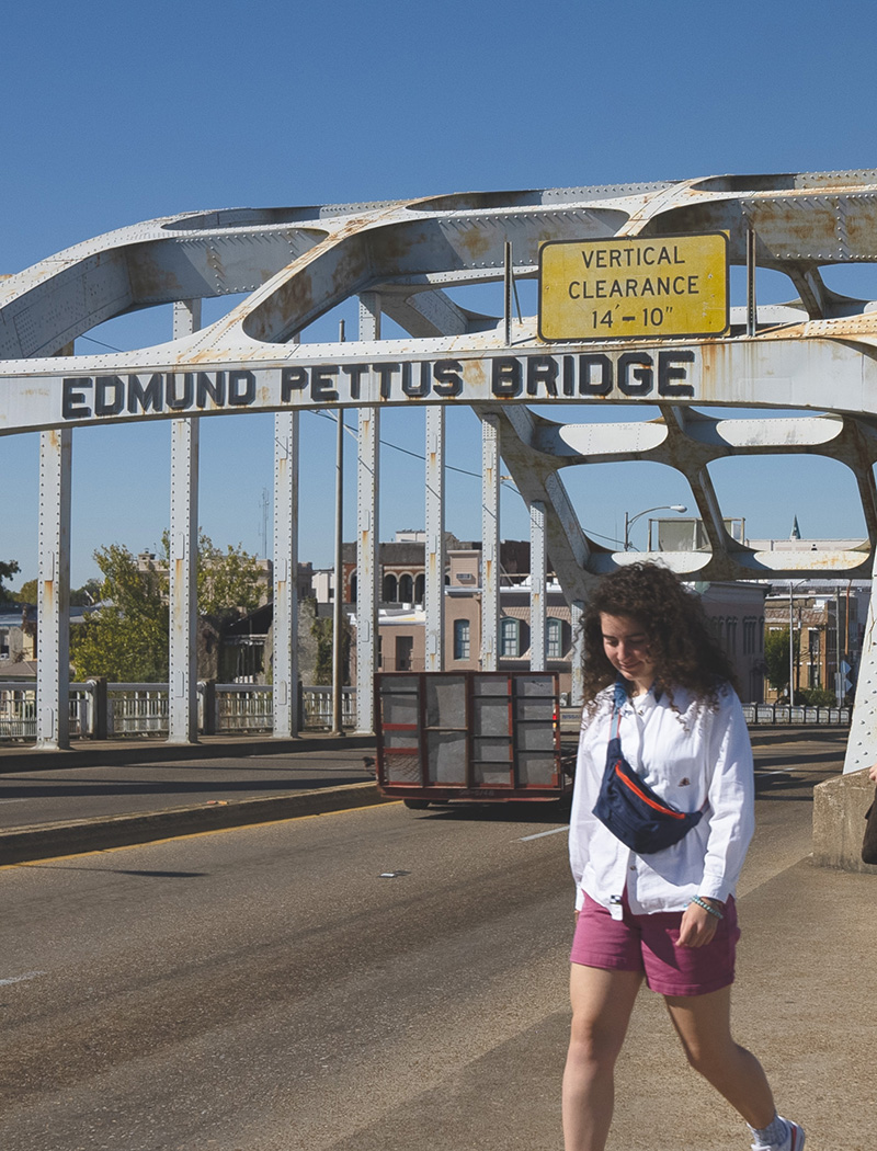 Cedarville University student, Angelina Vitarelli, as she walks across the Edmond Pettus Bridge in Selma, Alabama as part of the university's civil rights tour class.