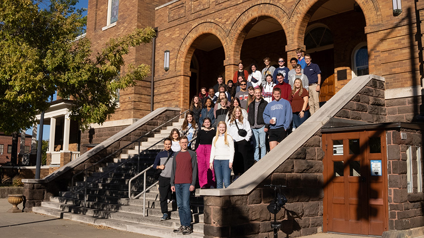 Cedarville University students and professors pose for a photo on the steps of the 16th Ave Baptist Church in Birmingham, Alabama while on the annual civil rights tour.