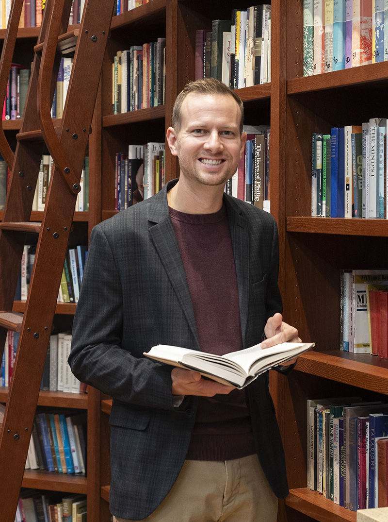 Dan Jacobsen in the Warren and Betty Wiersbe Library and Reading Room at Cedarville University.