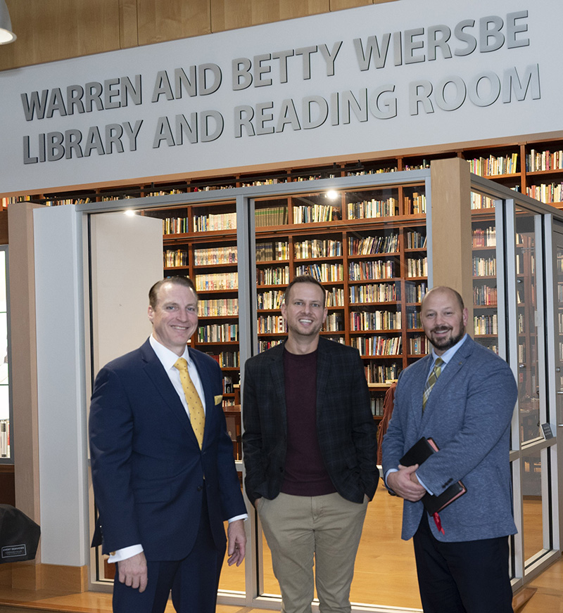 Dr. Thomas White, Dan Jacobsen, and Dr. Trent Rogers outside the Warren and Betty Wiersbe Library and Reading Room.