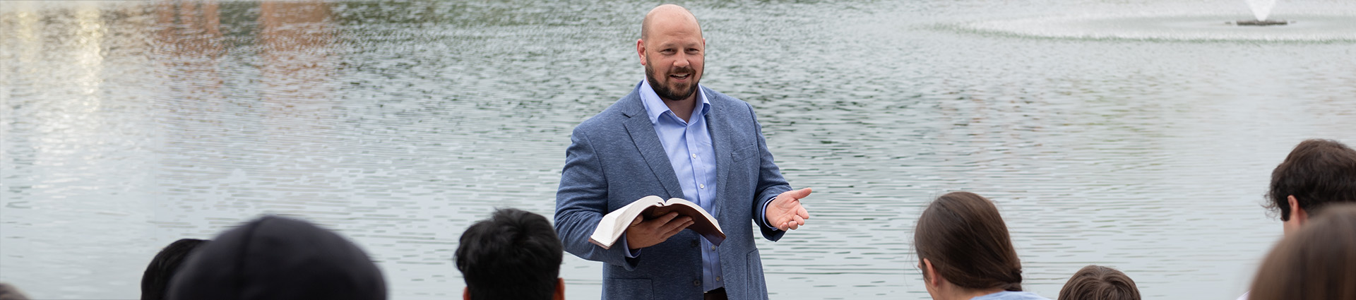 Dr. Trent Rogers teaching beside Cedar Lake.