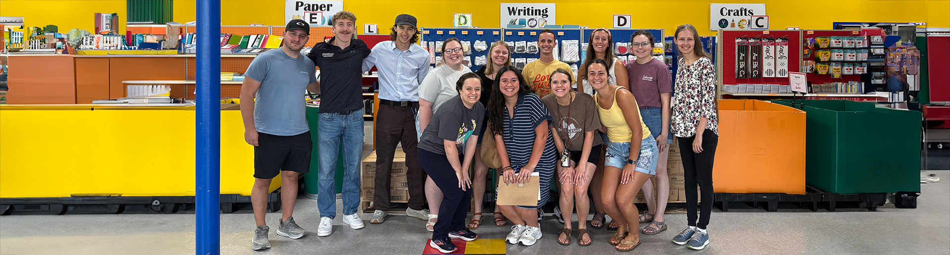New teachers who recently graduated Cedarville University receiving school supplies.