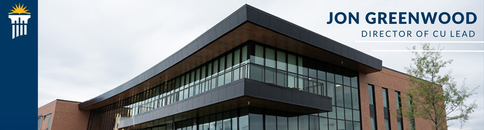 Scharnberg Business and Communication building on the campus of Cedarville University with CU logo and Jon Greenwood's name.