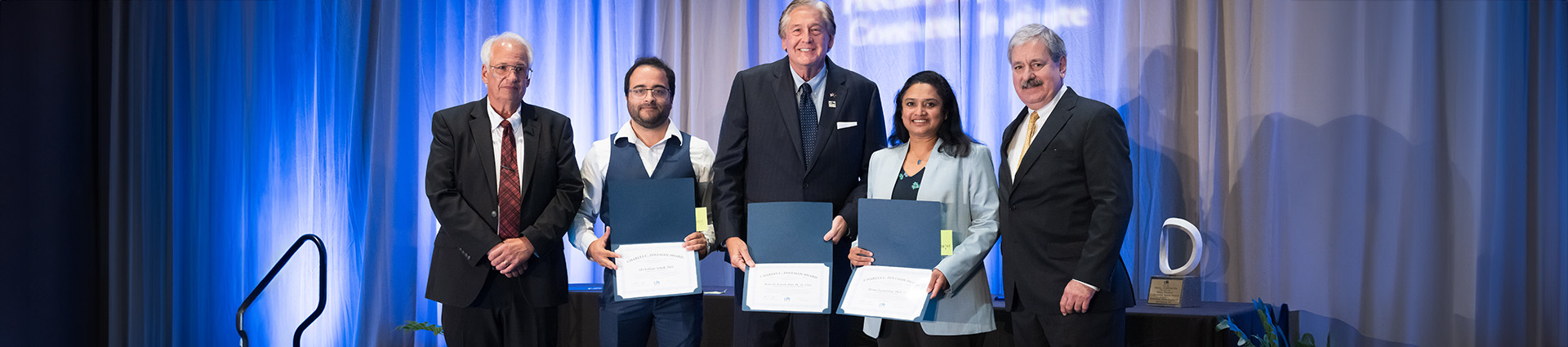 Dr. Hema Jayaseelan, second from right, receives the 2025 Charles C. Zollman Award.