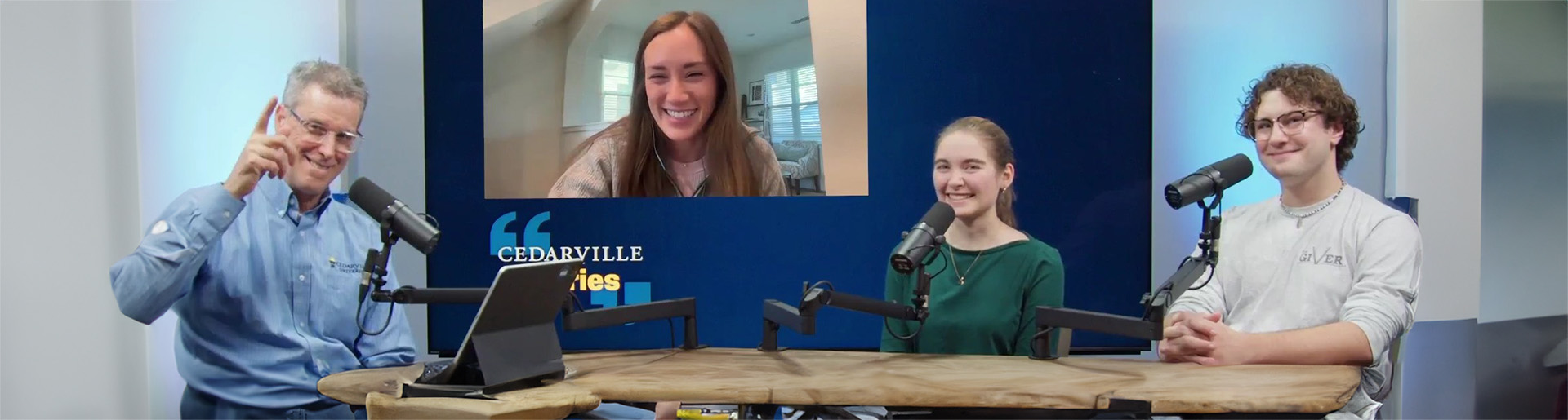 Mark Weinstein and public relations student writers and alumni on the Cedarville Stories podcast.