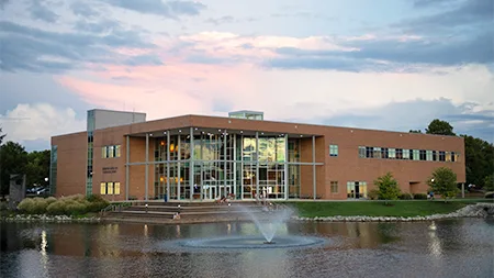 Center for Biblical and Theological Studies and Cedar Lake at sunset.