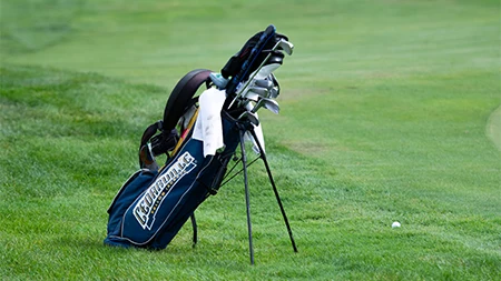 Cedarville golf bag on golf course.