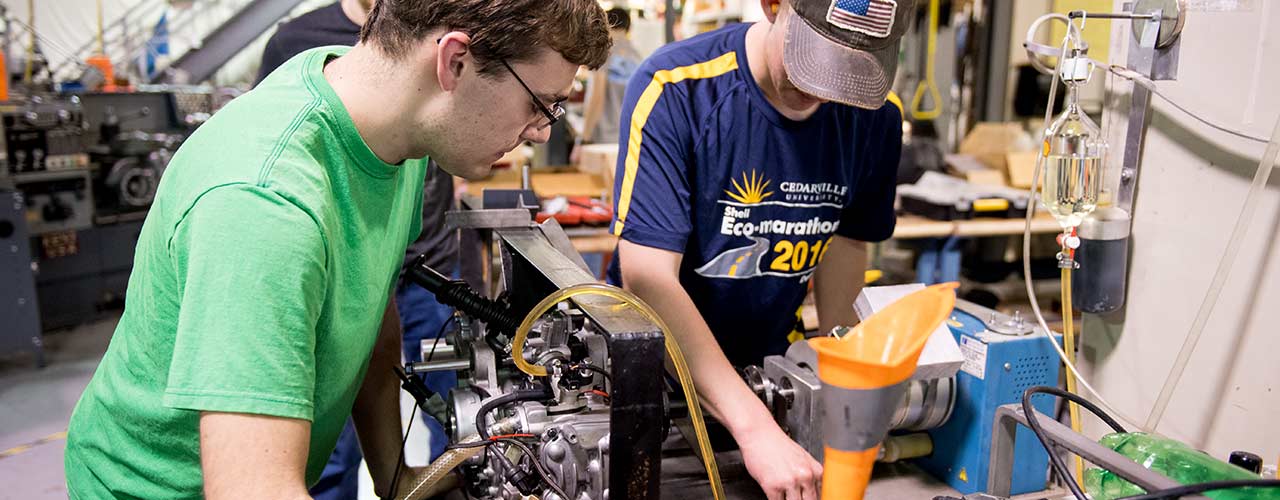 Male mechanical engineering students work on a project in Cedarville's Engineering Projects Lab