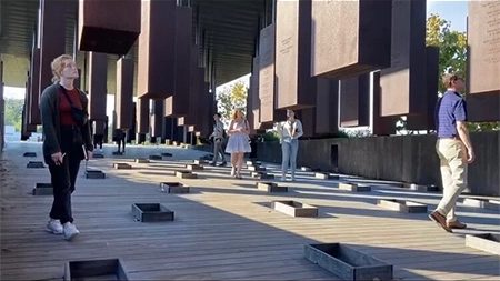 Students walking through the National Memorial for Peace and Justice.