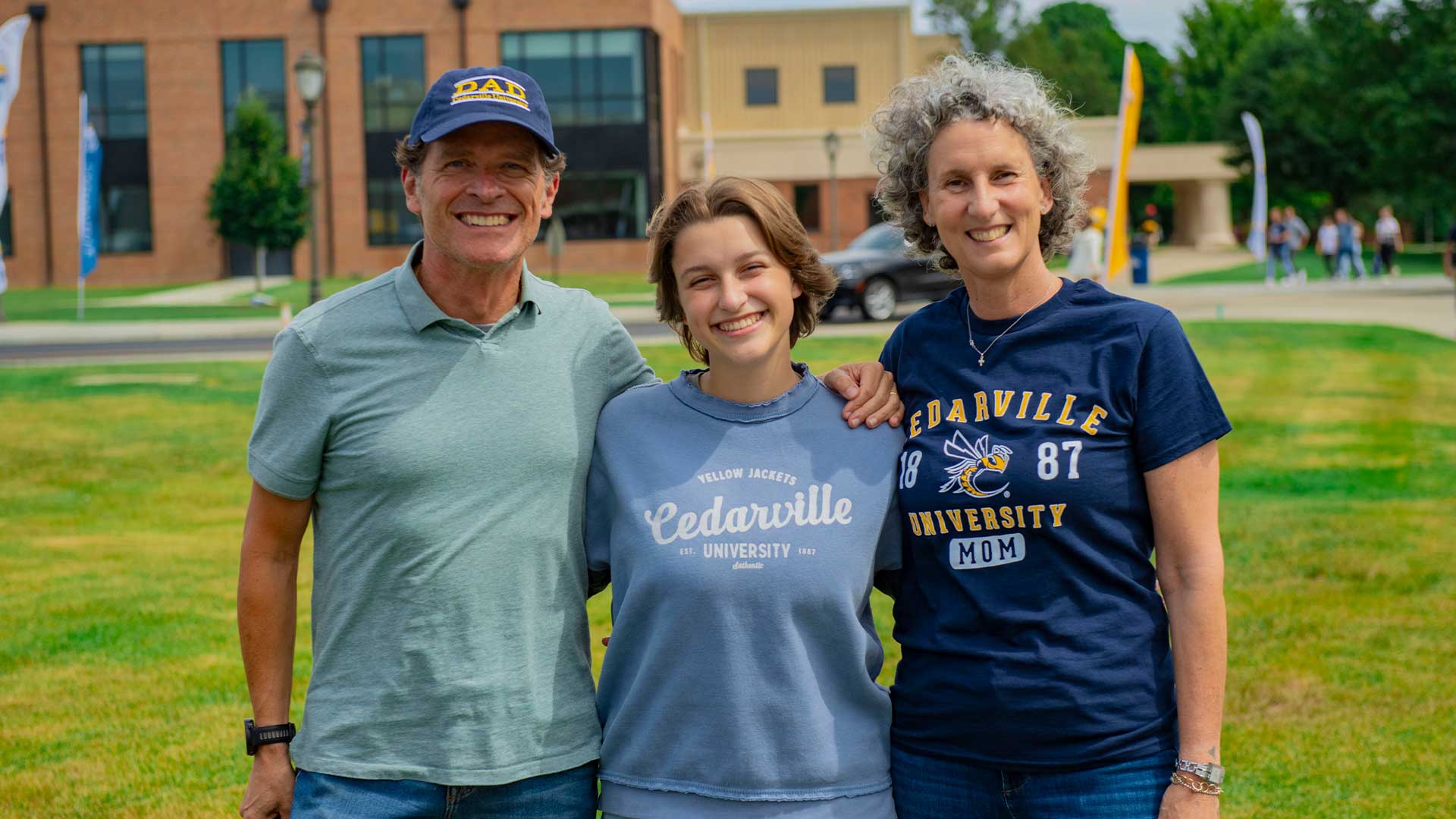 Family poses for a photo outside the Callan Athletic Center.