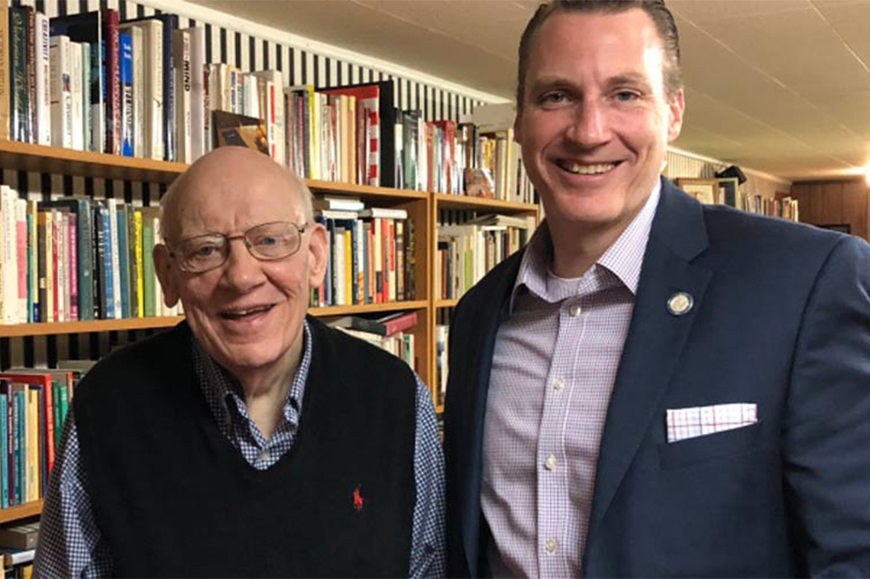 Dr. Warren Wiersbe and Dr. Thomas White smiling in Dr. Wiersbe's home library